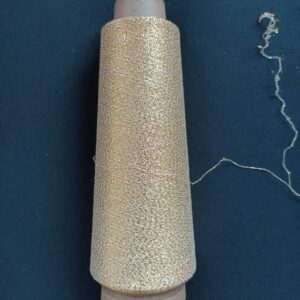 Rocca di filo elasticizzato con lamè color oro